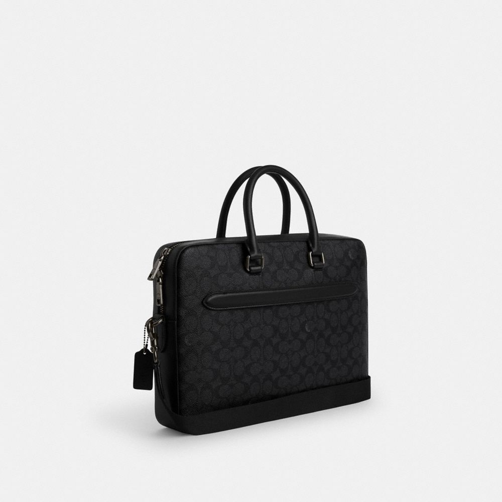 Interior view of the Coach Ethan Slim Brief showing the laptop sleeve and compartments