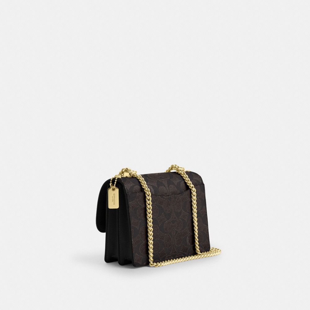 Coach Mini Klare Crossbody Bag In Signature Canvas Gold Walnut Black