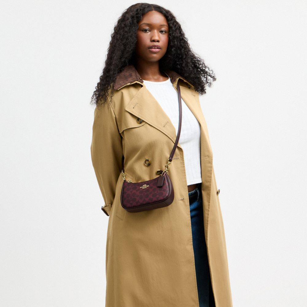 Coach Teri Mini Crossbody Bag In Signature Canvas Gold/Black Currant