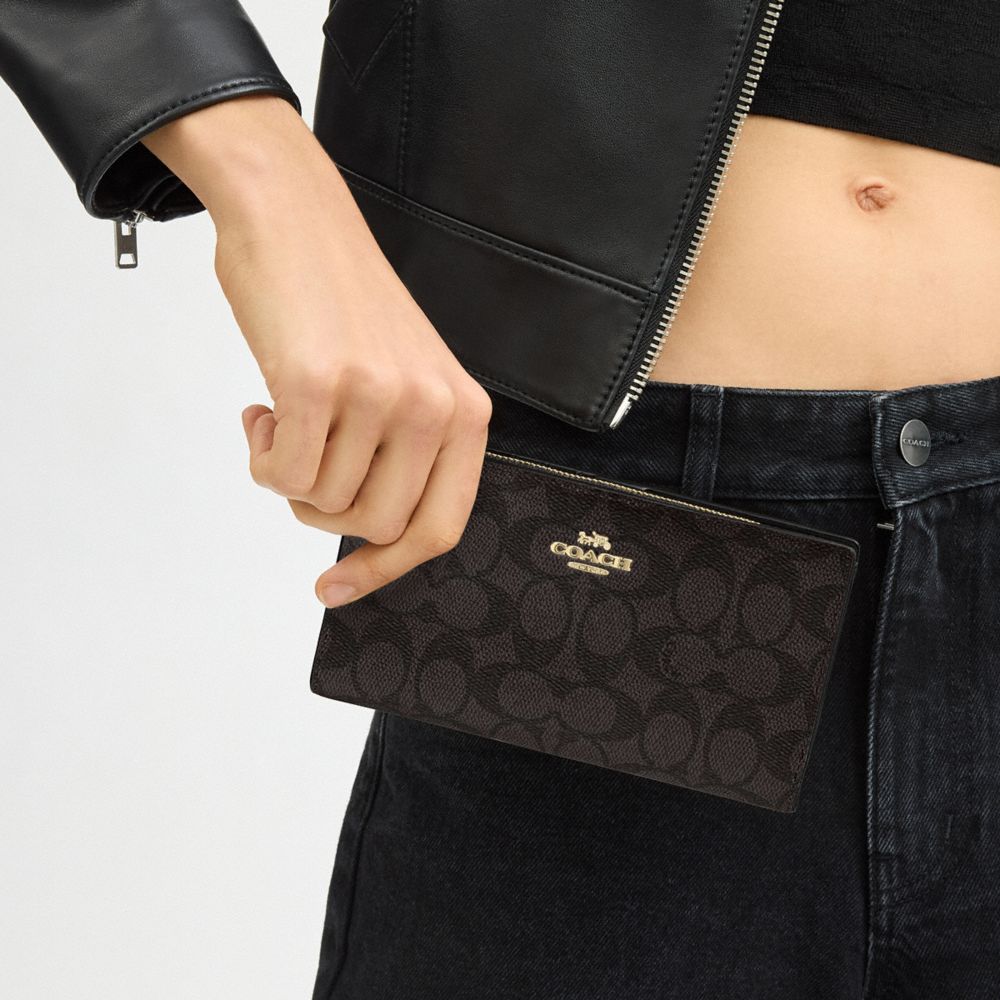 Coach Slim Zip Wallet In Signature Canvas Gold Walnut Black