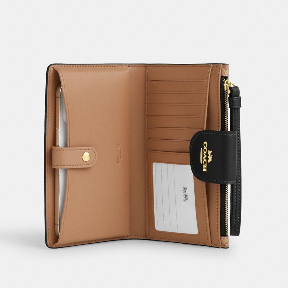 Coach Phone Wallet In Signature Canvas Gold Tan Black