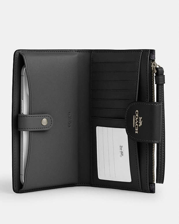 スマホ収納OK!【COACH】Phone Wallet In Signature Canvas Coach Phone Wallet In Signature Canvas | Brixton Baker