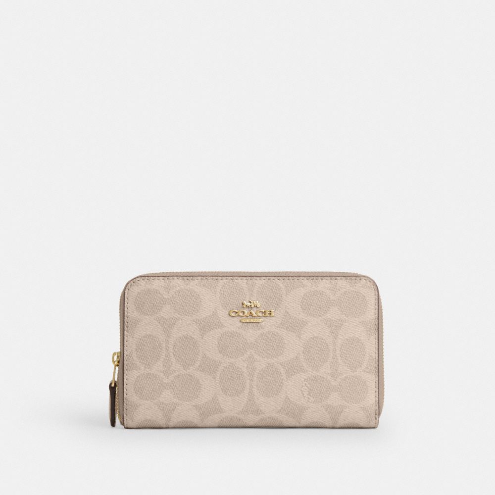Coach Medium Id Zip Wallet In Signature Canvas Gold Sand Chalk