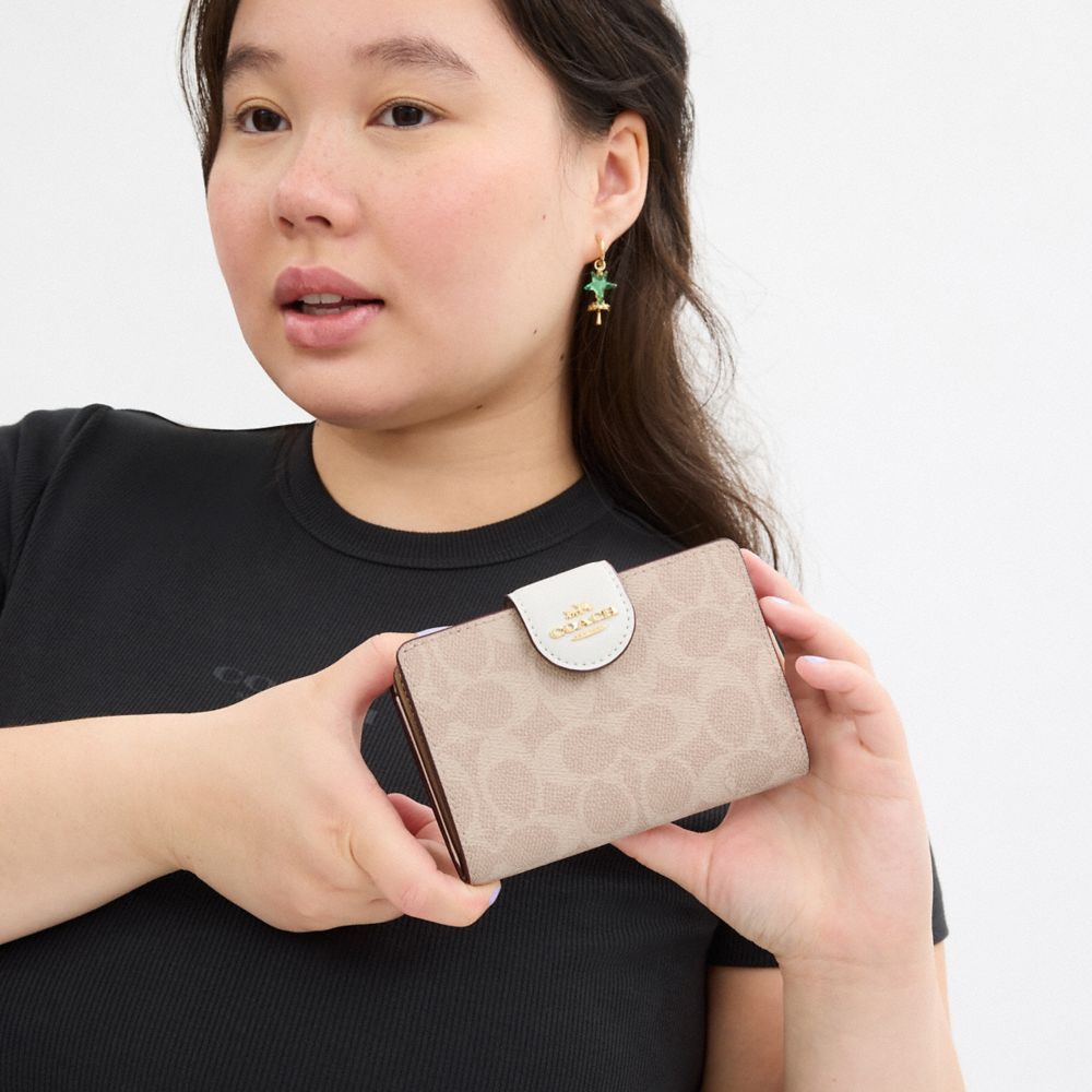 Coach Medium Corner Zip Wallet In Signature Canvas Gold Sand Chalk