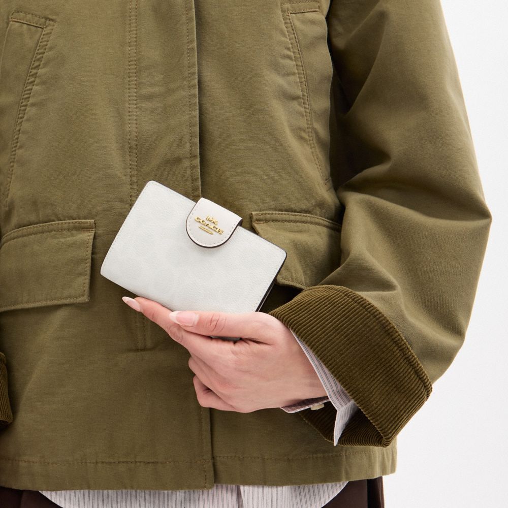 Coach Medium Corner Zip Wallet In Signature Canvas Gold White Chalk