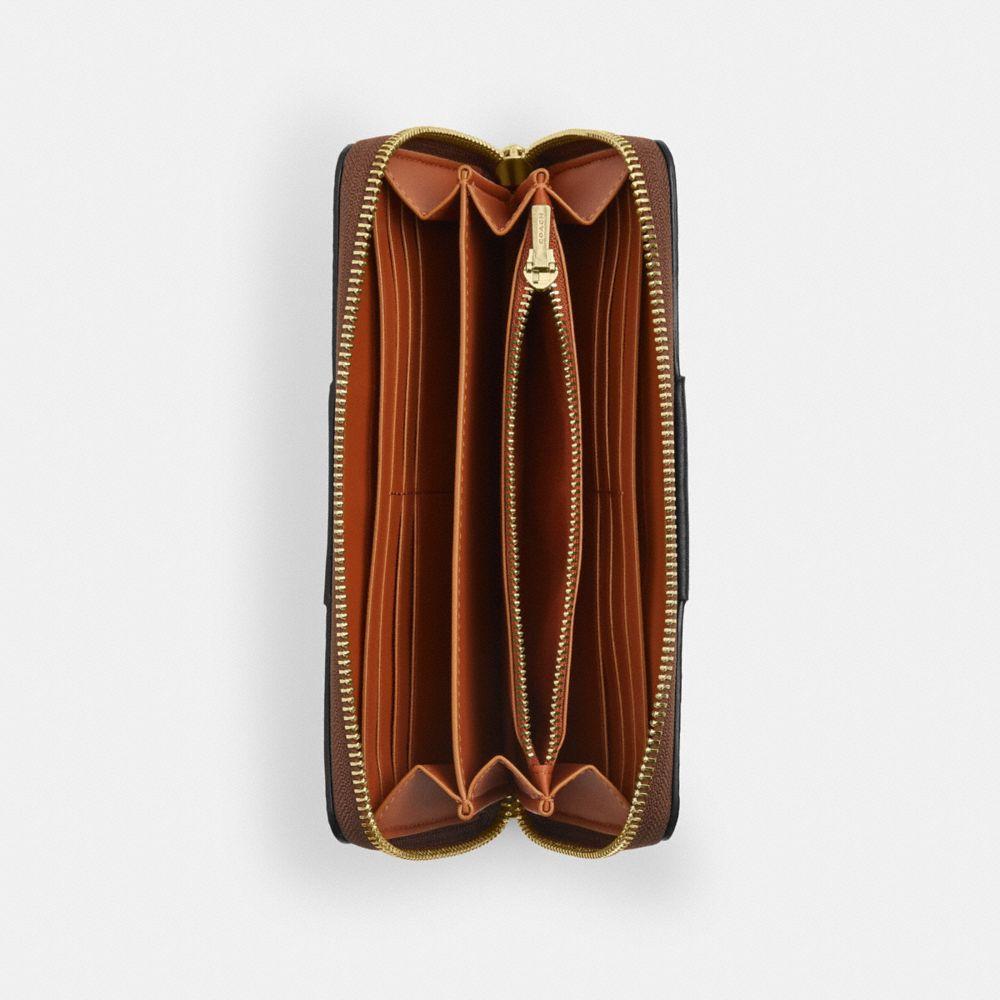 Coach Long Zip Around Wallet In Signature Canvas With Stripe Gold Tan Black