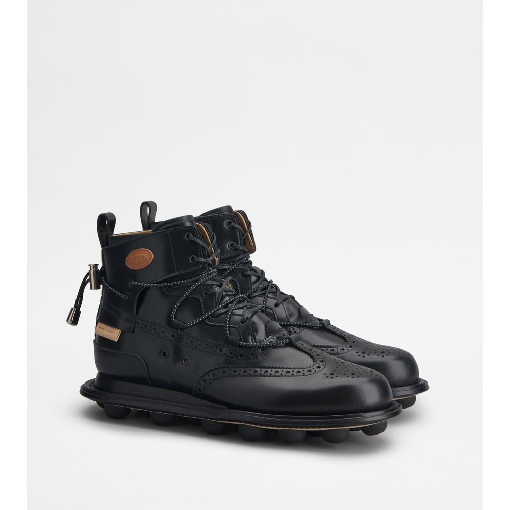 Tods Ankle Boots In Leather Nero Mens