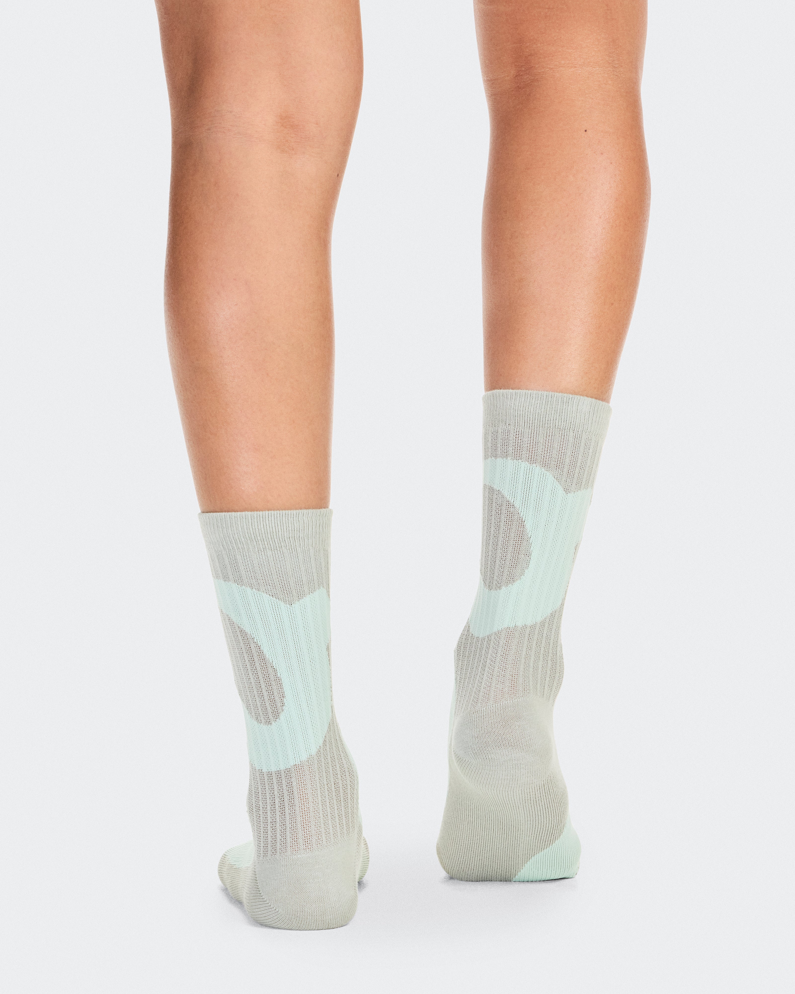 On Liquid Logo Sock High 2P Ivory | Tin