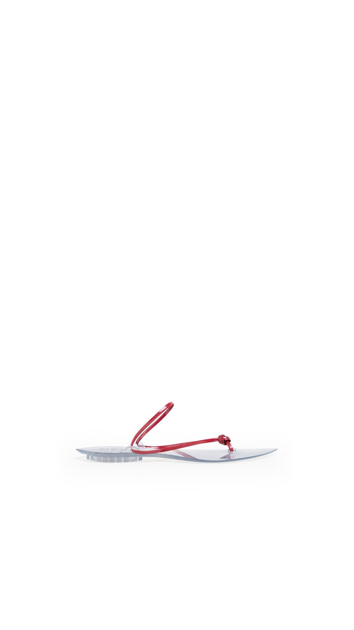 Alaïa Invisible Thong In Patent Leather
