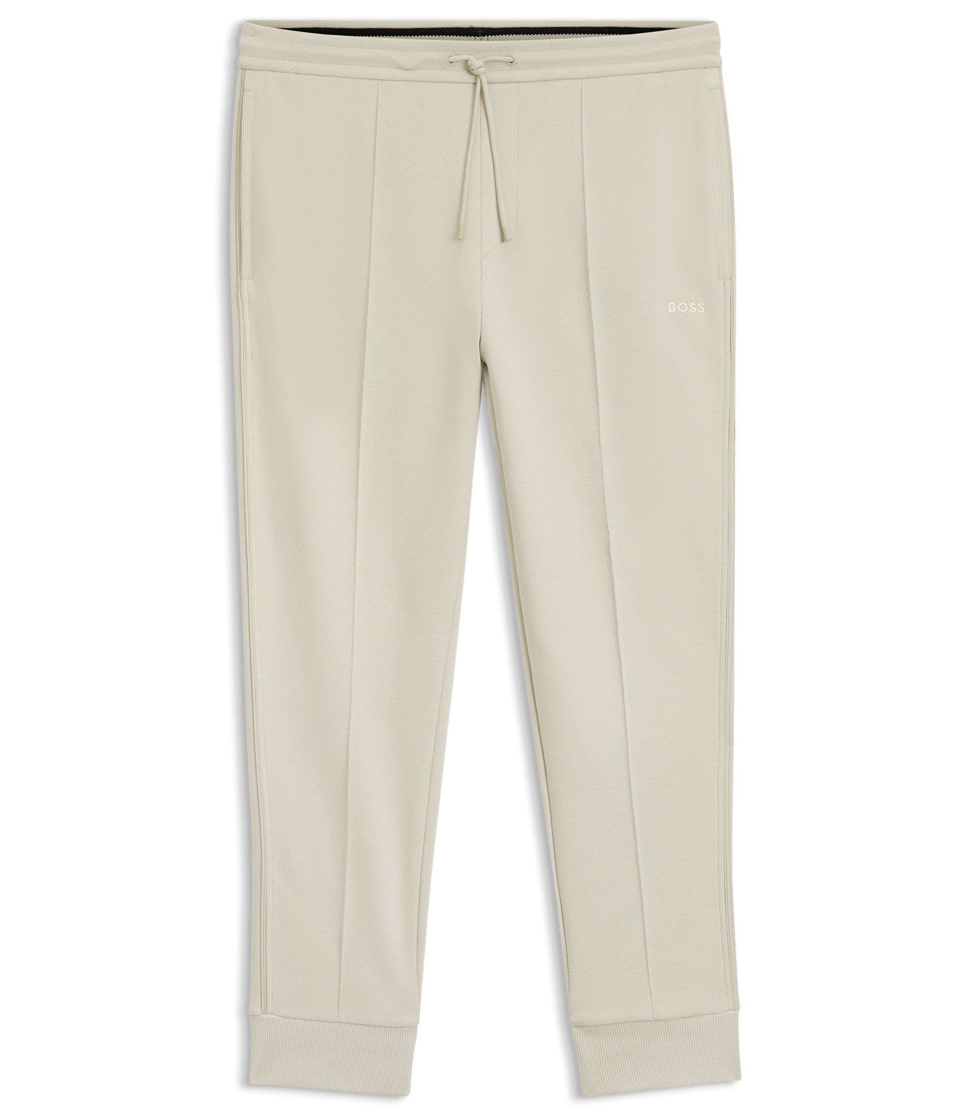 Boss Piping Detail Tracksuit Bottoms In A Cotton Blend Light Beige