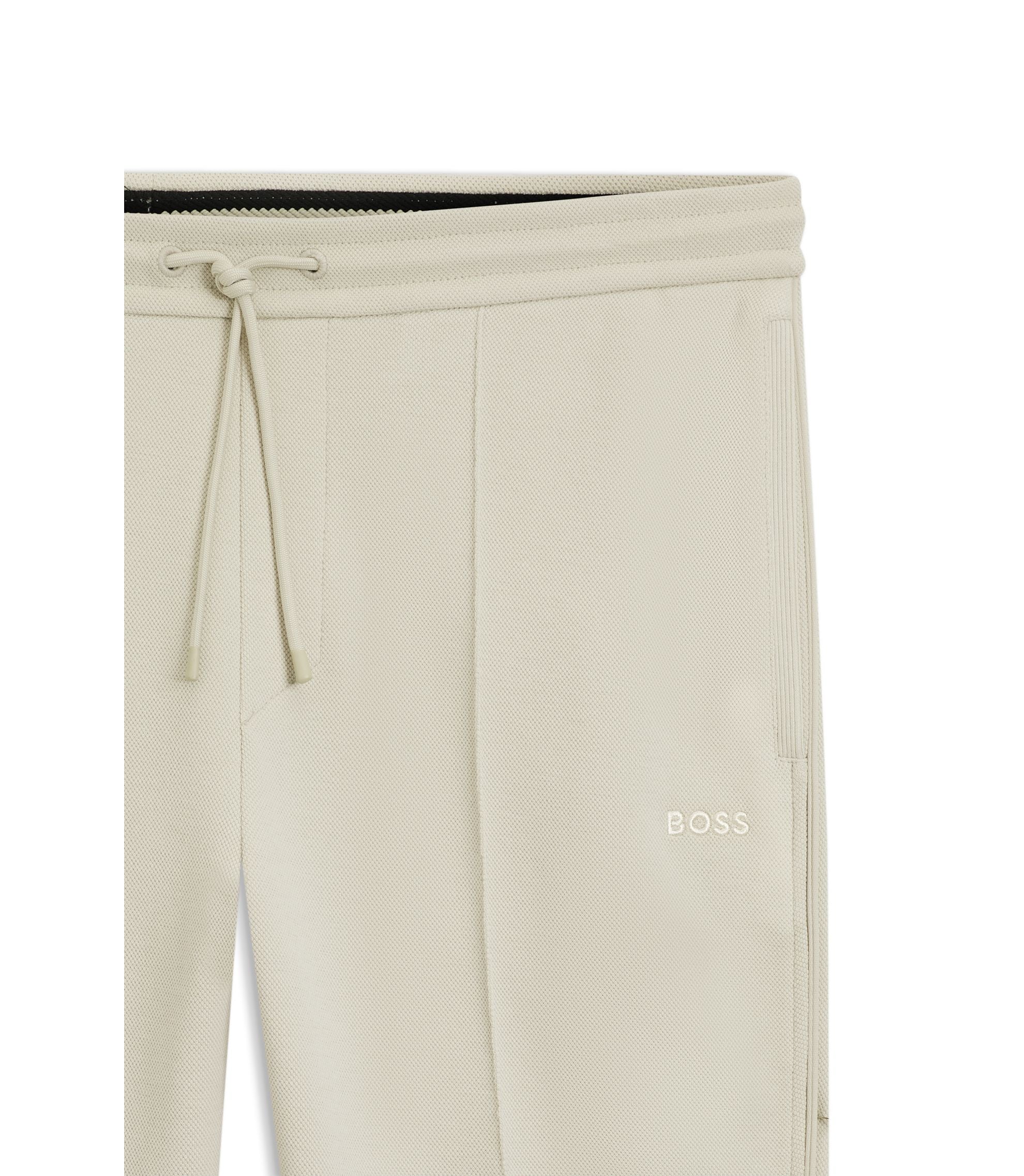Boss Piping Detail Tracksuit Bottoms In A Cotton Blend Light Beige