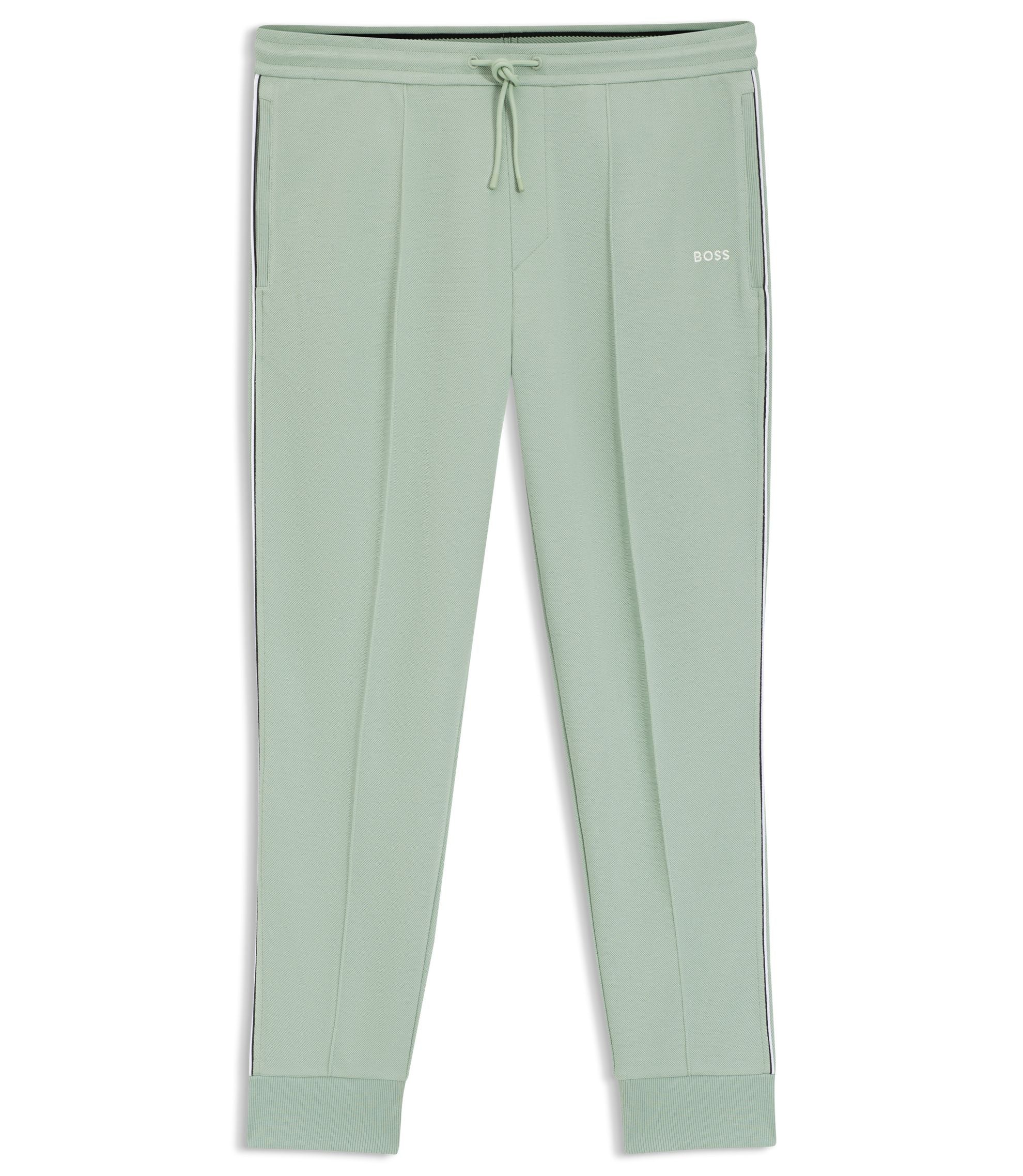 Boss Piping Detail Tracksuit Bottoms In A Cotton Blend Light Green