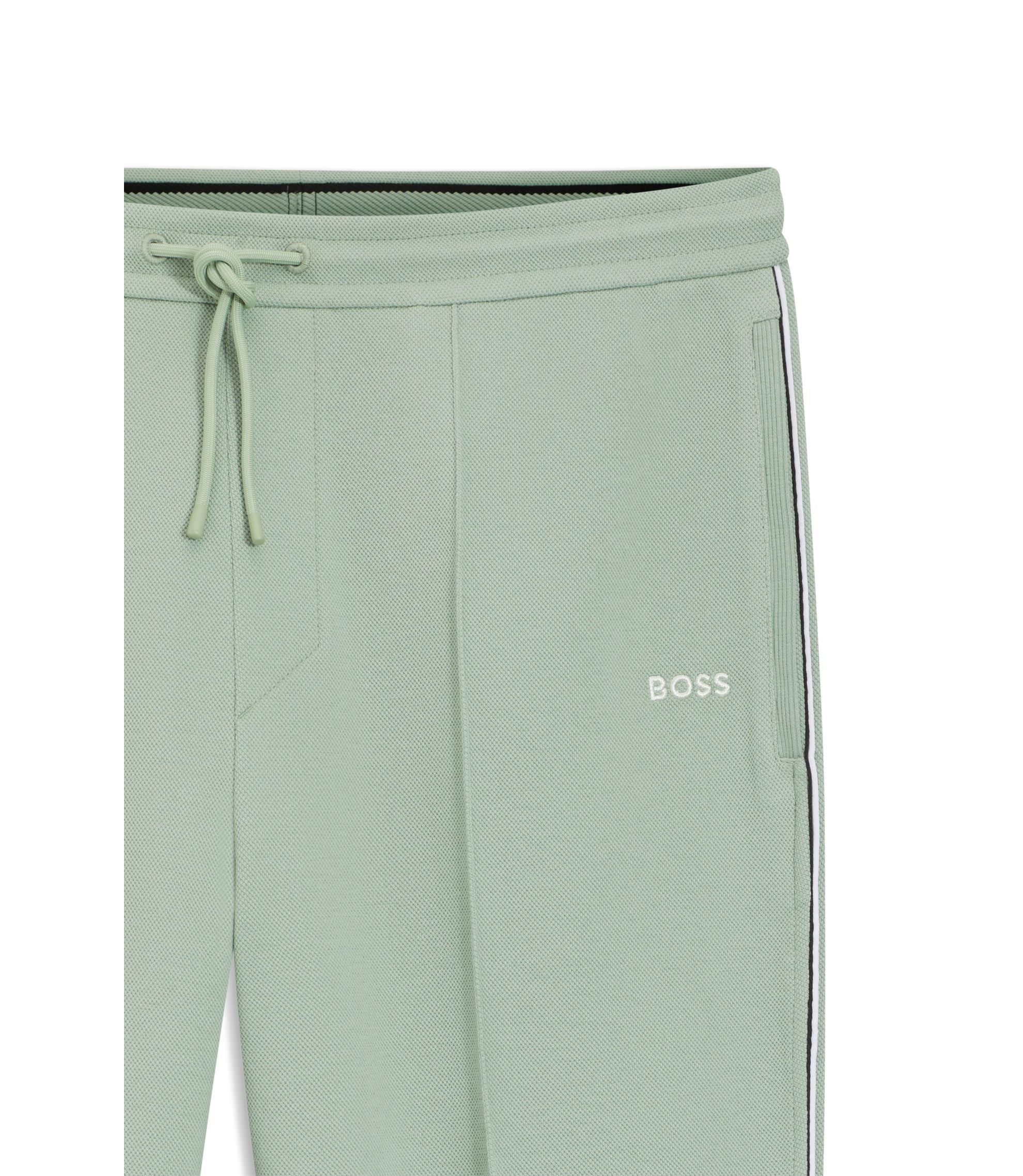 Boss Piping Detail Tracksuit Bottoms In A Cotton Blend Light Green