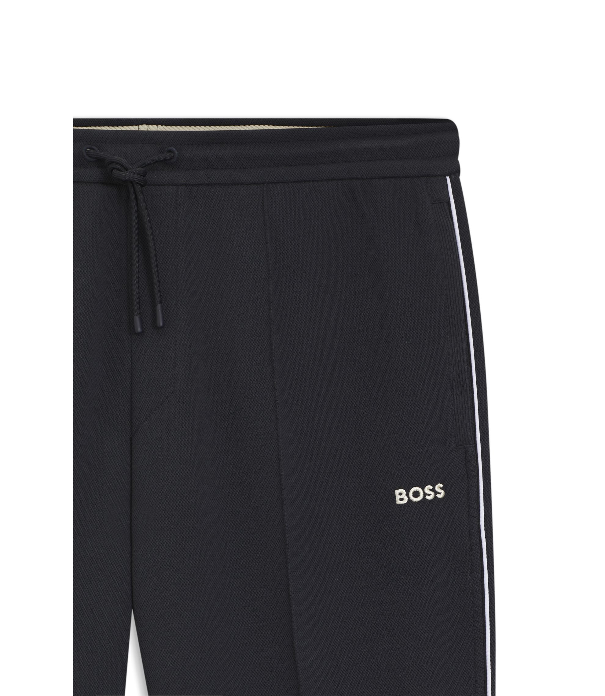 Boss Piping Detail Tracksuit Bottoms In A Cotton Blend Dark Blue