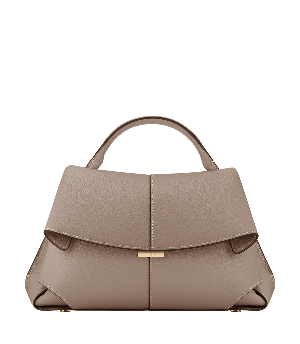 Polene Mokki bag in Textured Taupe showing folded leather construction and cut corner detail