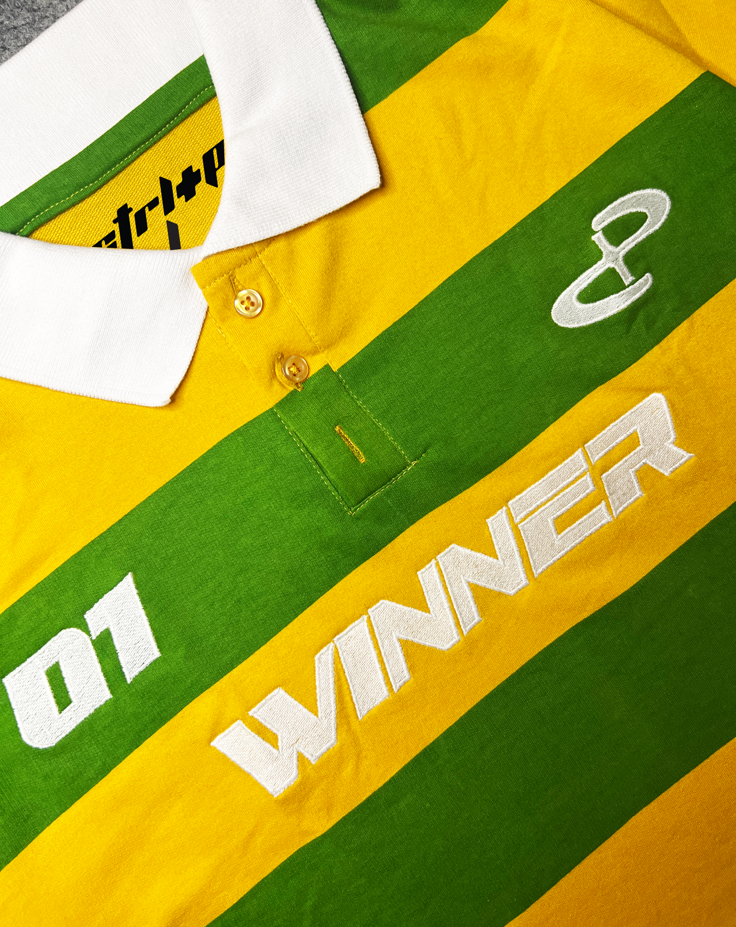 VICTORY LAP POLO T-SHIRT