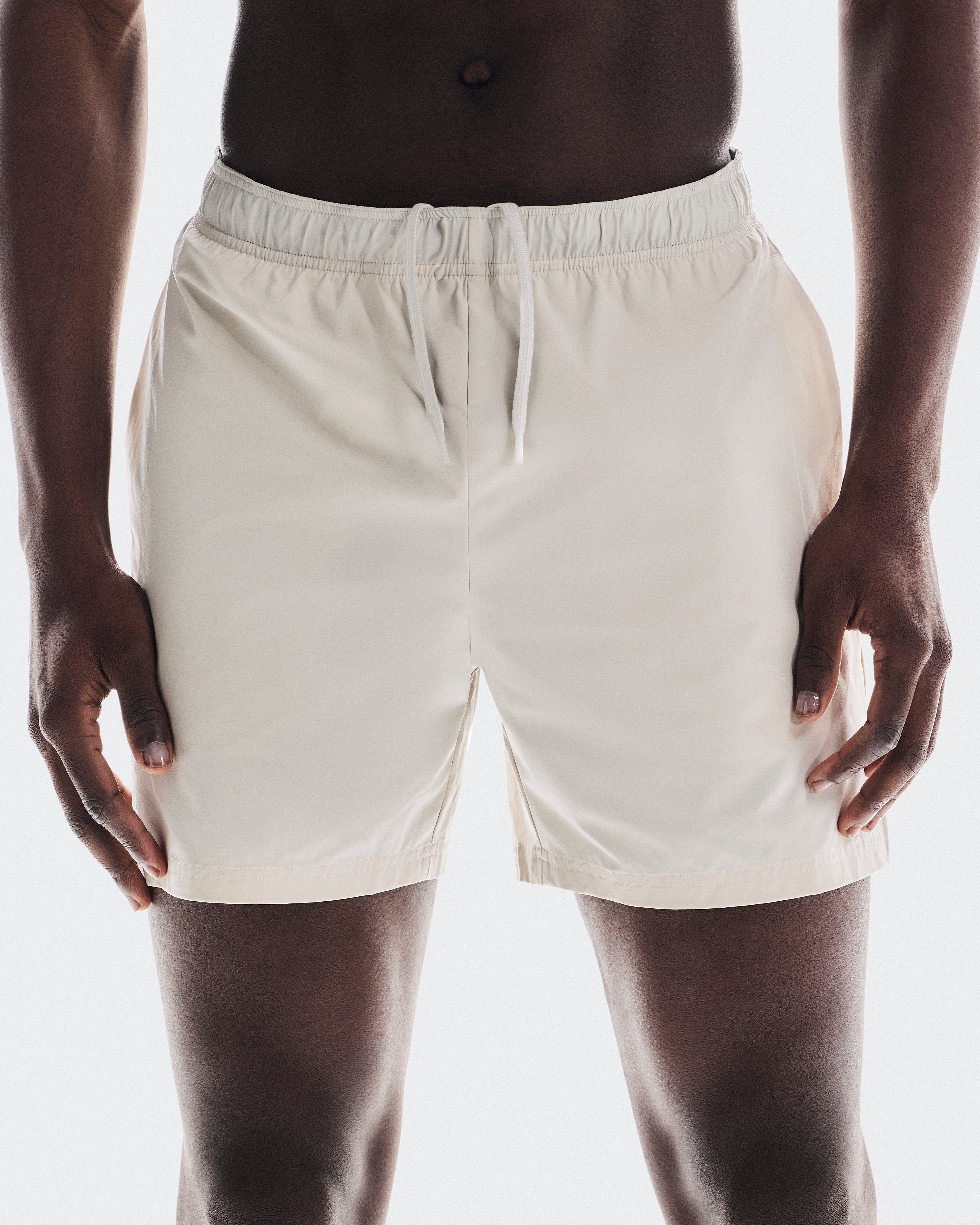 on 5" core shorts Sand