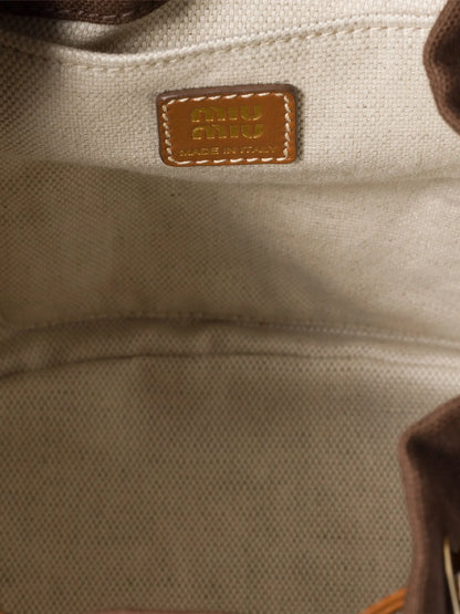Miu Miu Canvas and Leather Backpack