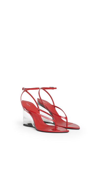Alaïa Invisible Thong Sandals In Patent Calfskin