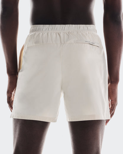 on 5" core shorts Sand