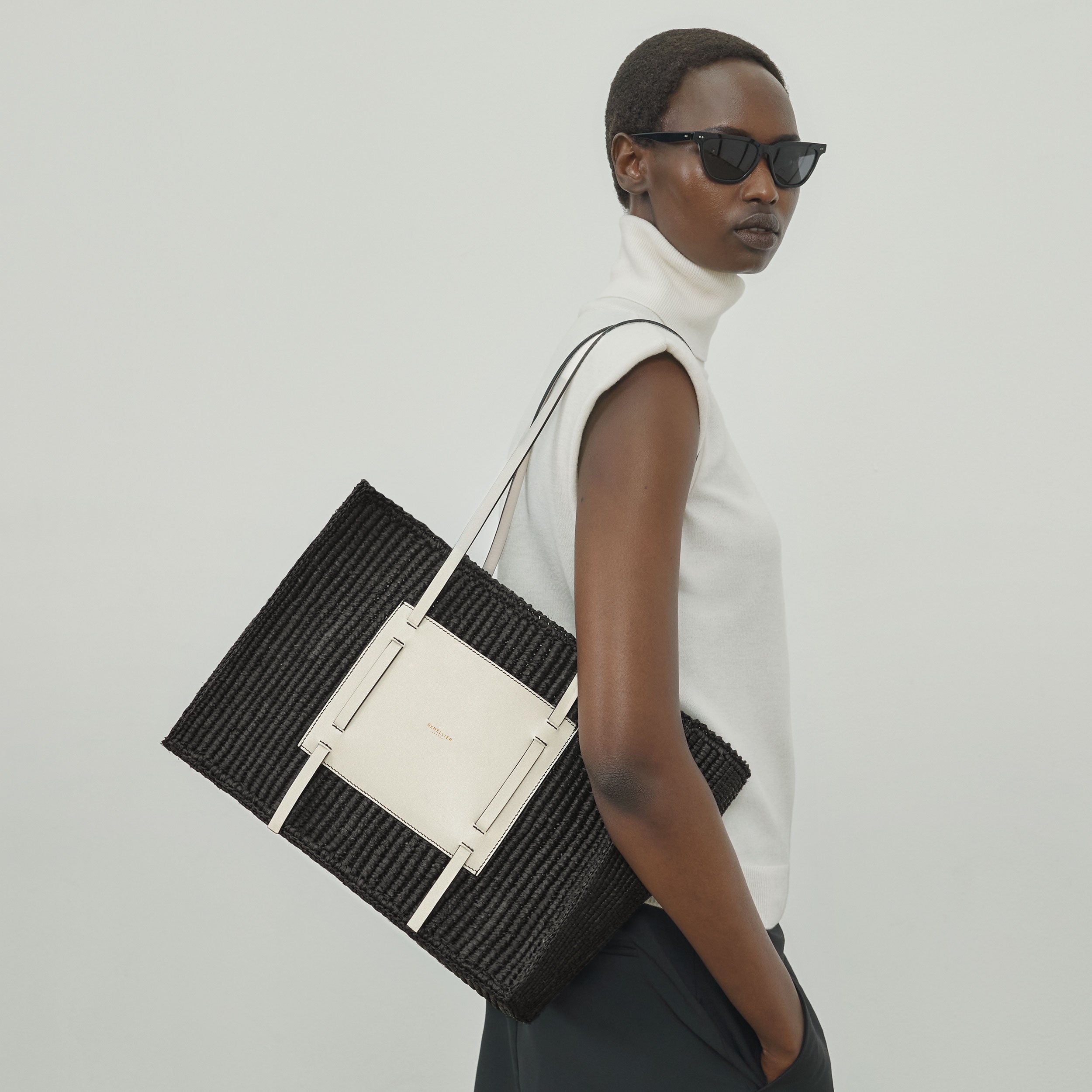DeMellier The Capri salt & pepper canvas black smooth
