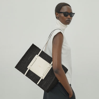 DeMellier The Capri salt & pepper canvas black smooth