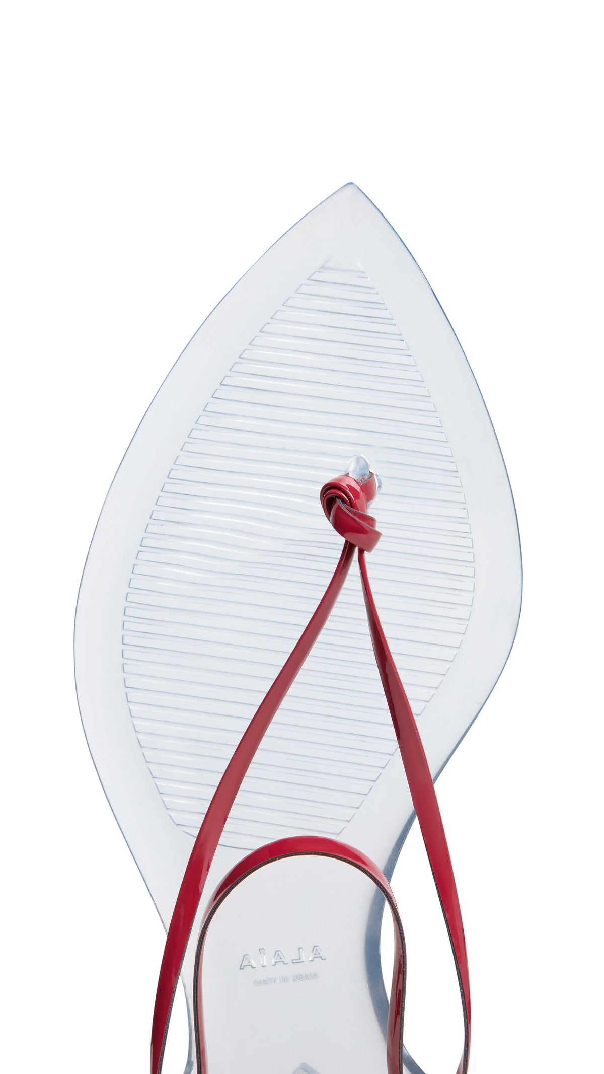 Alaïa Invisible Thong In Patent Leather
