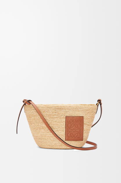 Loewe Slit pochette bag in raffia and calfskin