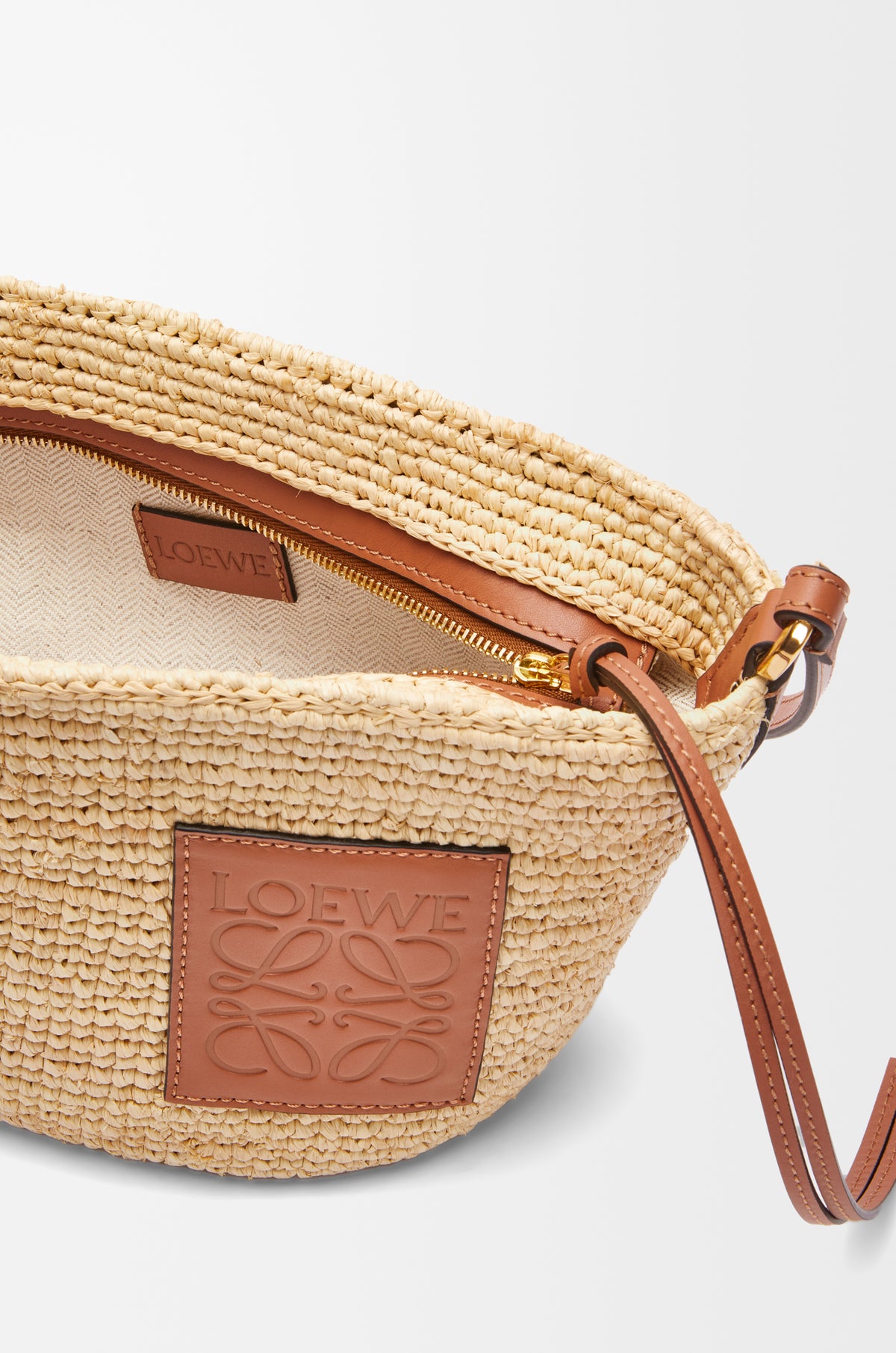 Loewe Slit pochette bag in raffia and calfskin