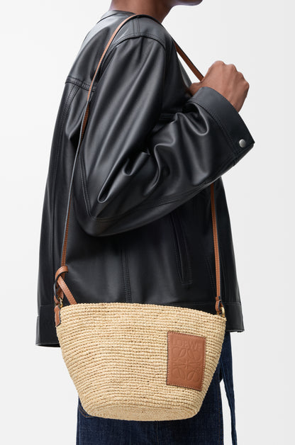 Loewe Slit pochette bag in raffia and calfskin