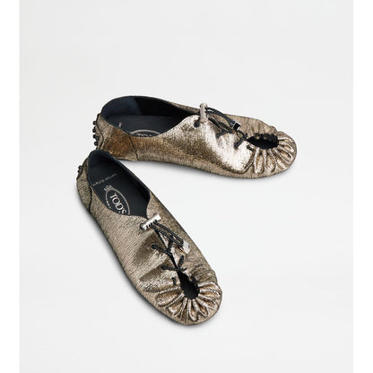 Tods Gommino In Leather With Drawstring Gold Womens
