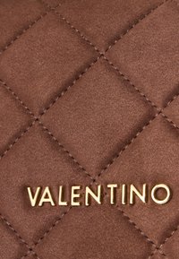 Valentino Ocarina Handbag Moro