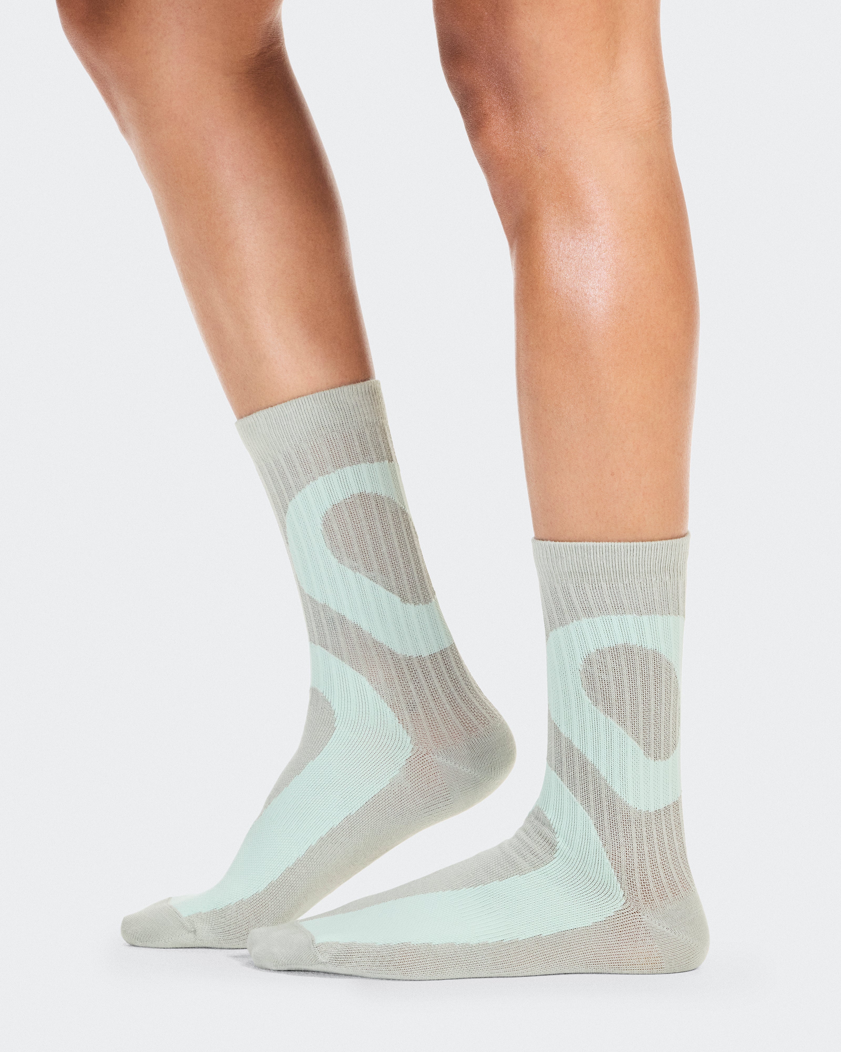 On Liquid Logo Sock High 2P Ivory | Tin