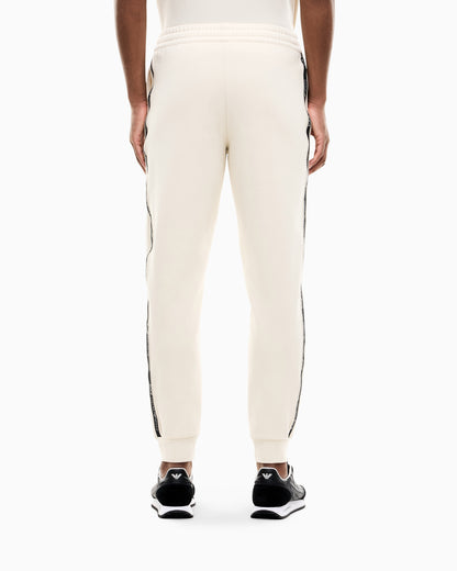 EA7 Slim fit pants Logo Series in cotton jersey with tape