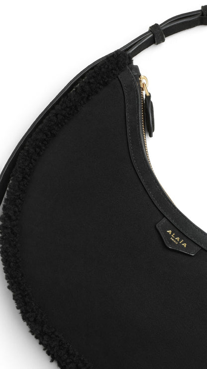 Alaïa One Piece Demi Lune Bag In Merino Shearling