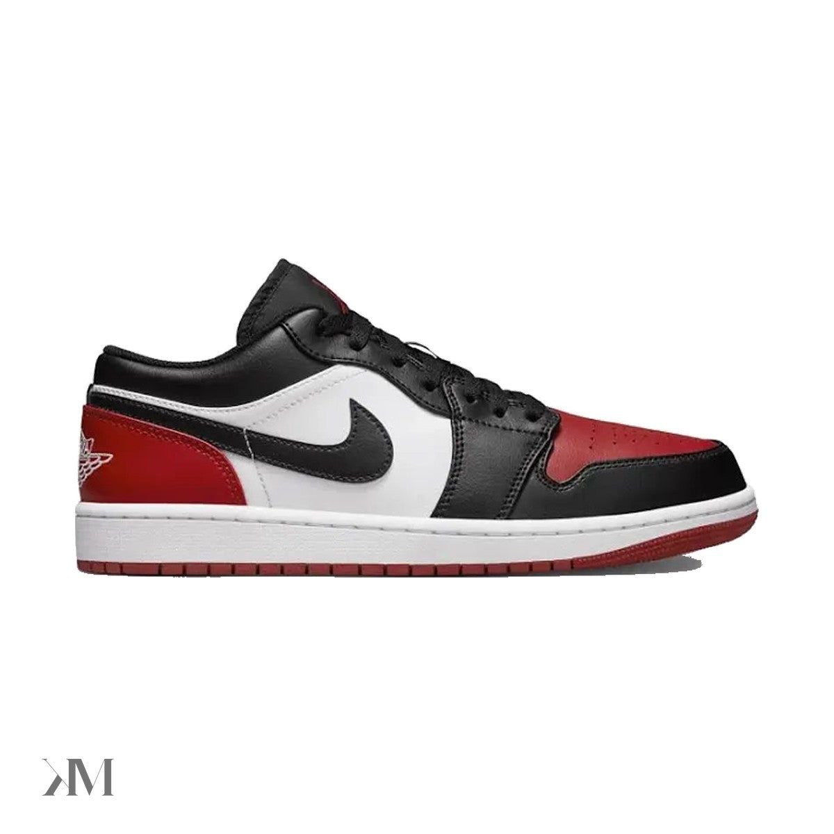 Air Jordan 1 Low Bred Toe 2.0 sneaker in black, white, and red colourway