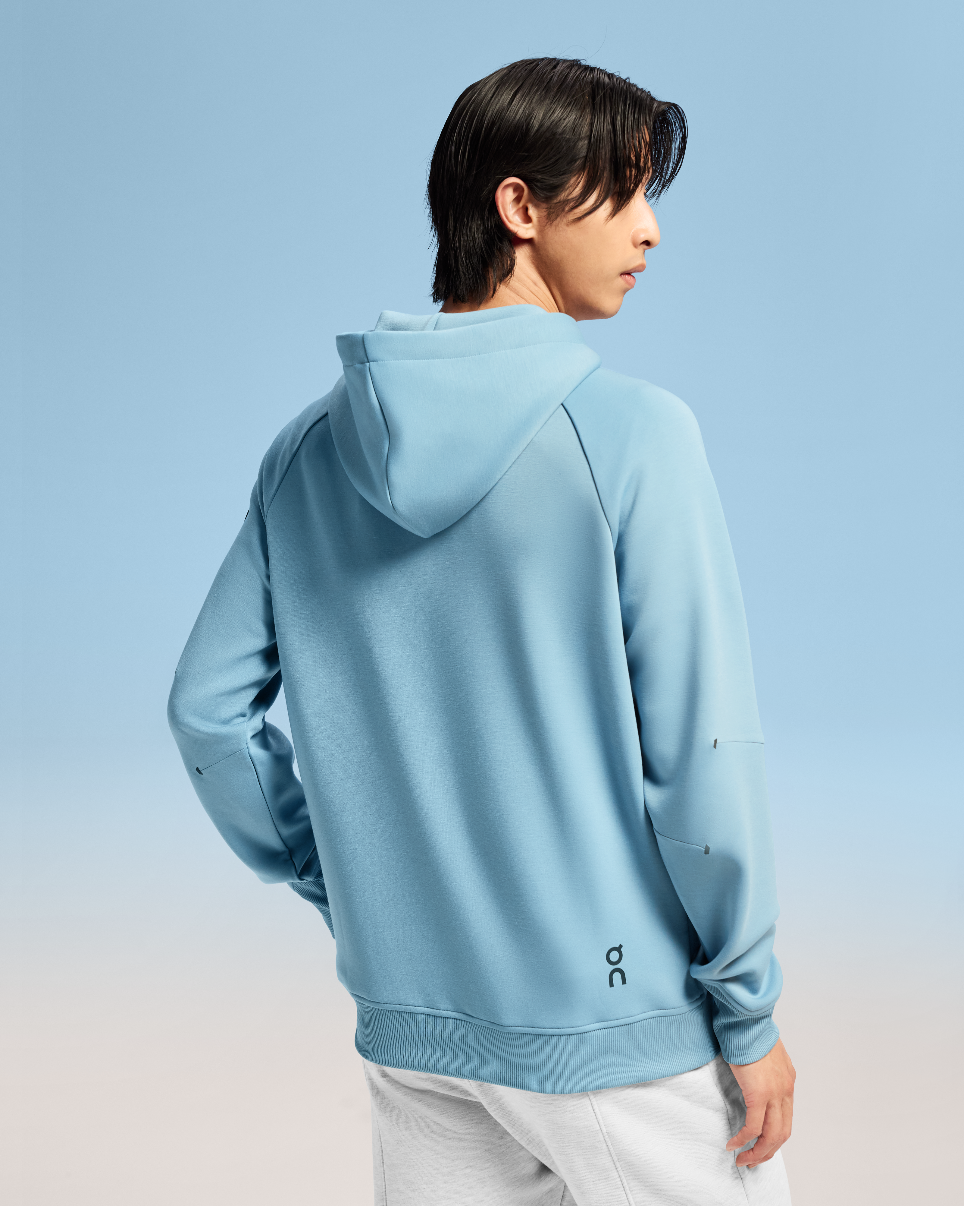 on hoodie Coast