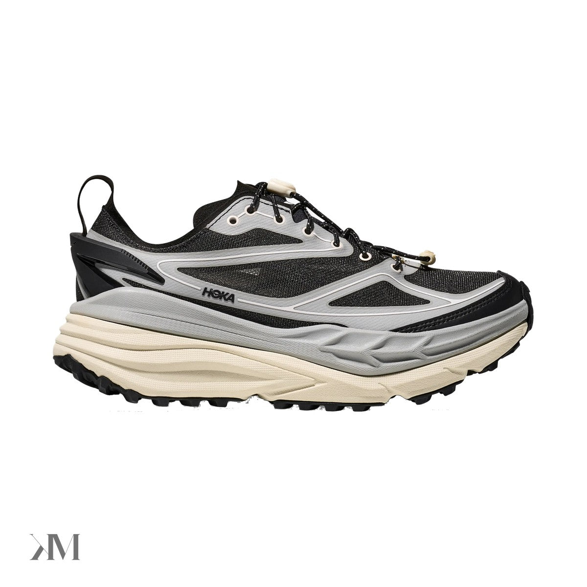 Hoka Stinson One7 Stellar Grey Eggshell hybrid trail lifestyle shoe side profile showing translucent upper and 3D TPU heel clip