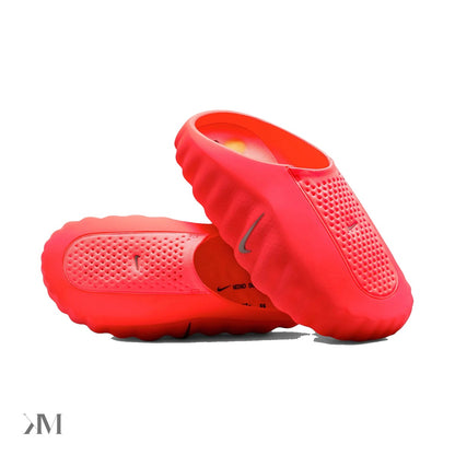 Nike Mind 001 Slide Solar Red, side profile showing vivid red strap and 22-node foam sole platform