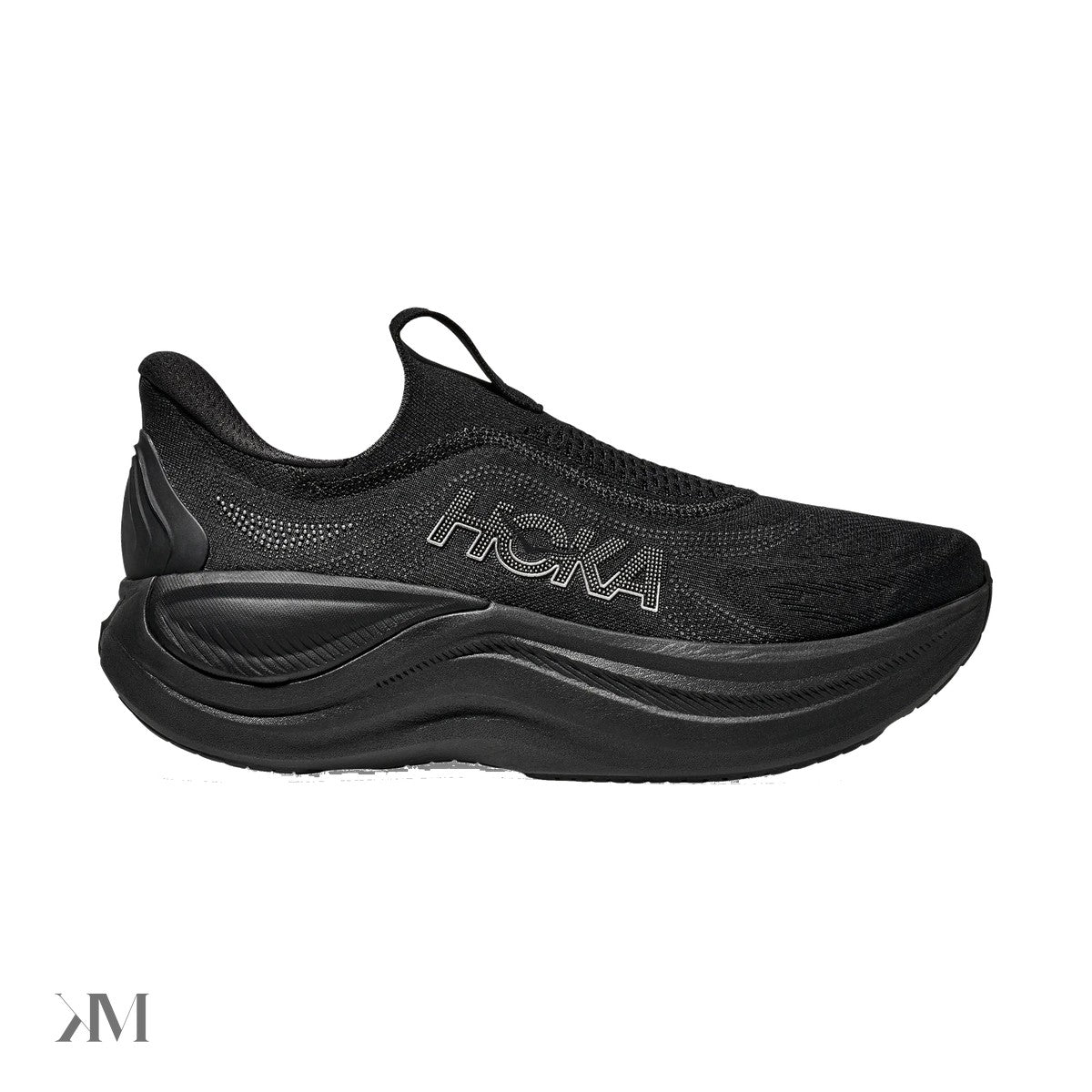 Hoka Skyward Laceless Black Black slip-on recovery shoe with thick midsole and Active Foot Frame, side view