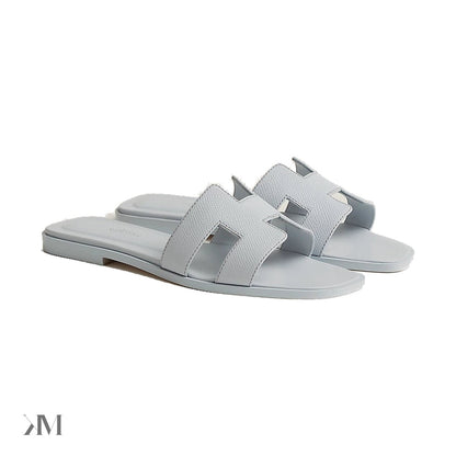 Hermes Oran Sandals in Blue Glacier, side profile