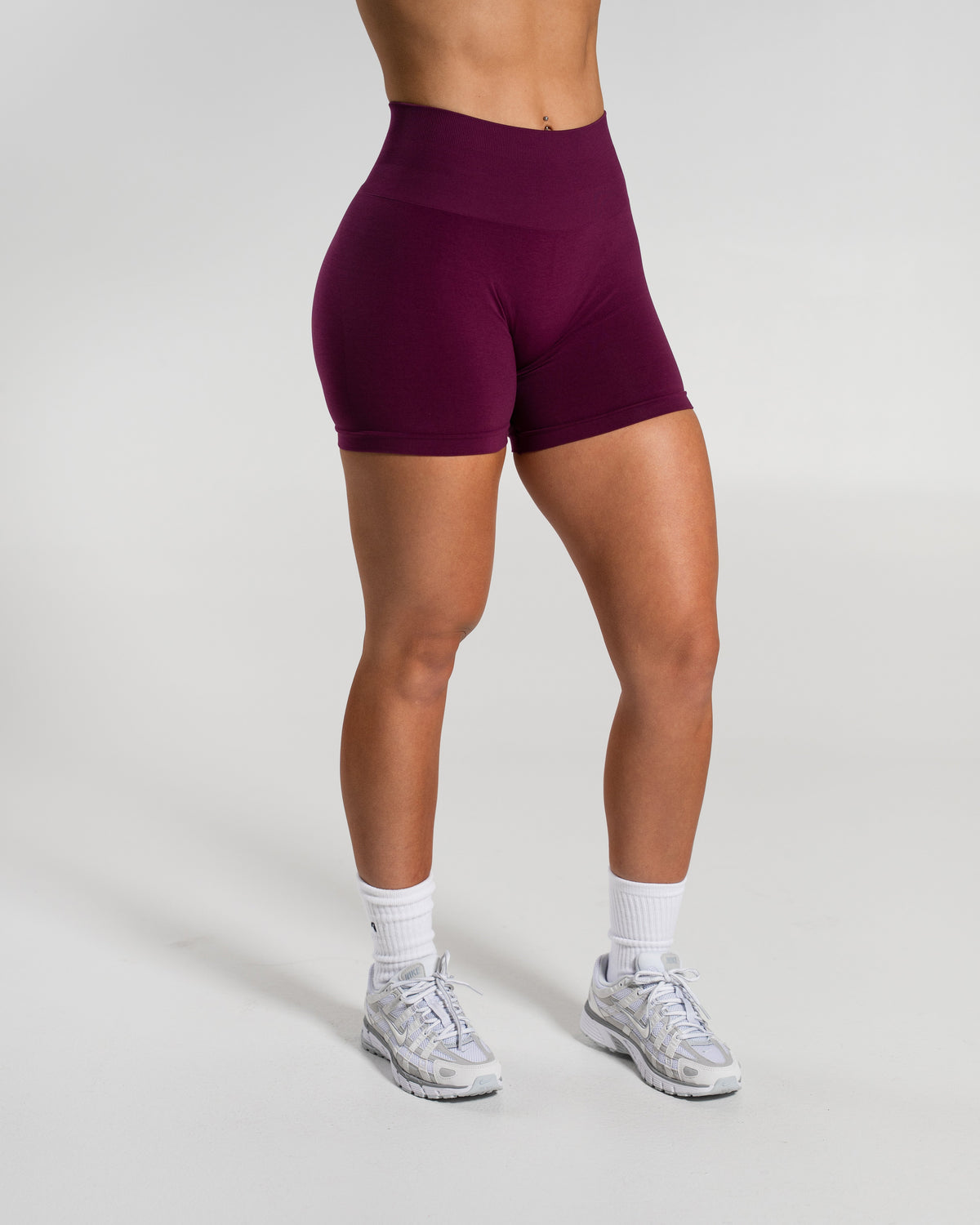Alphalete Women's Amplify Mid Rise Short