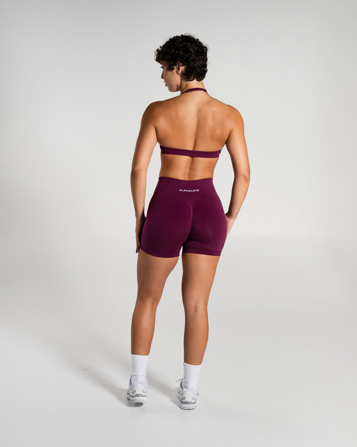 Alphalete Women's Amplify Mid Rise Short