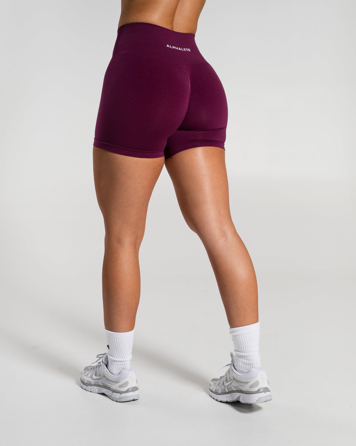 Alphalete Women's Amplify Mid Rise Short