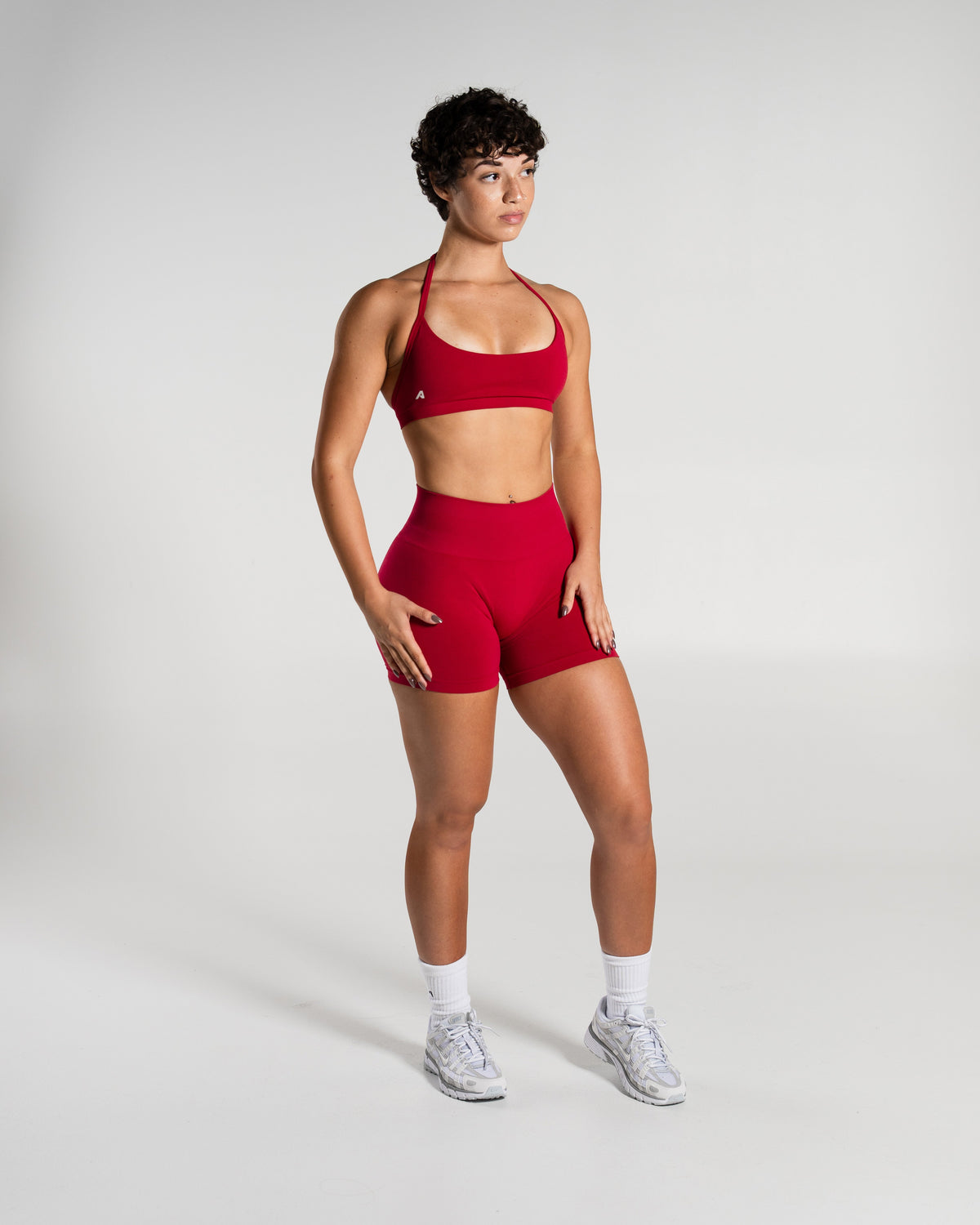 Alphalete Women's Amplify Mid Rise Short