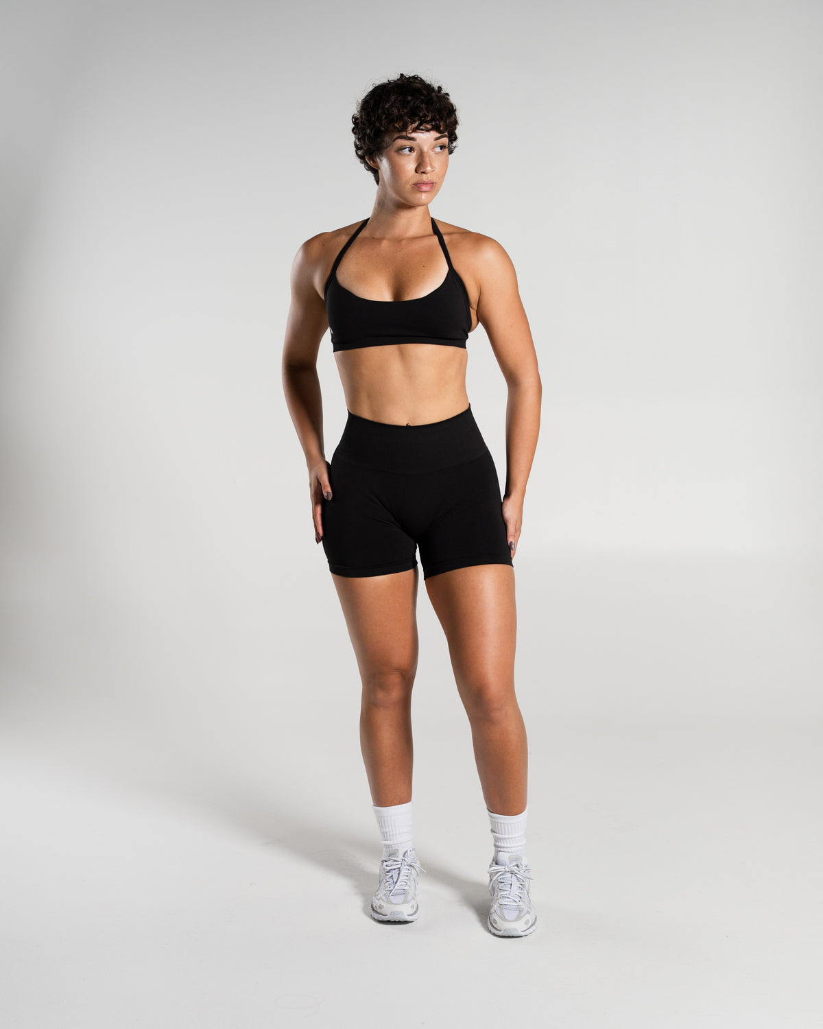 Alphalete Women's Amplify Mid Rise Short