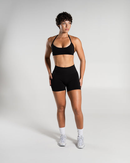 Alphalete Women's Amplify Mid Rise Short