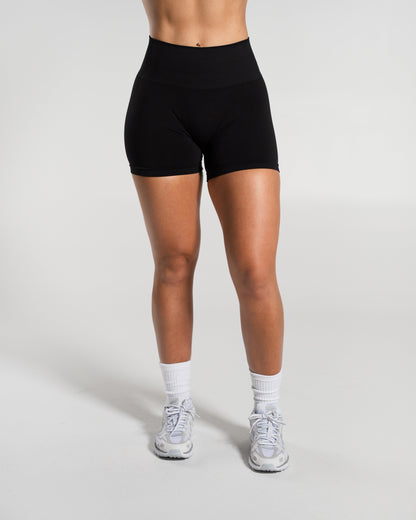 Alphalete Women's Amplify Mid Rise Short