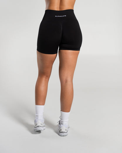 Alphalete Women's Amplify Mid Rise Short