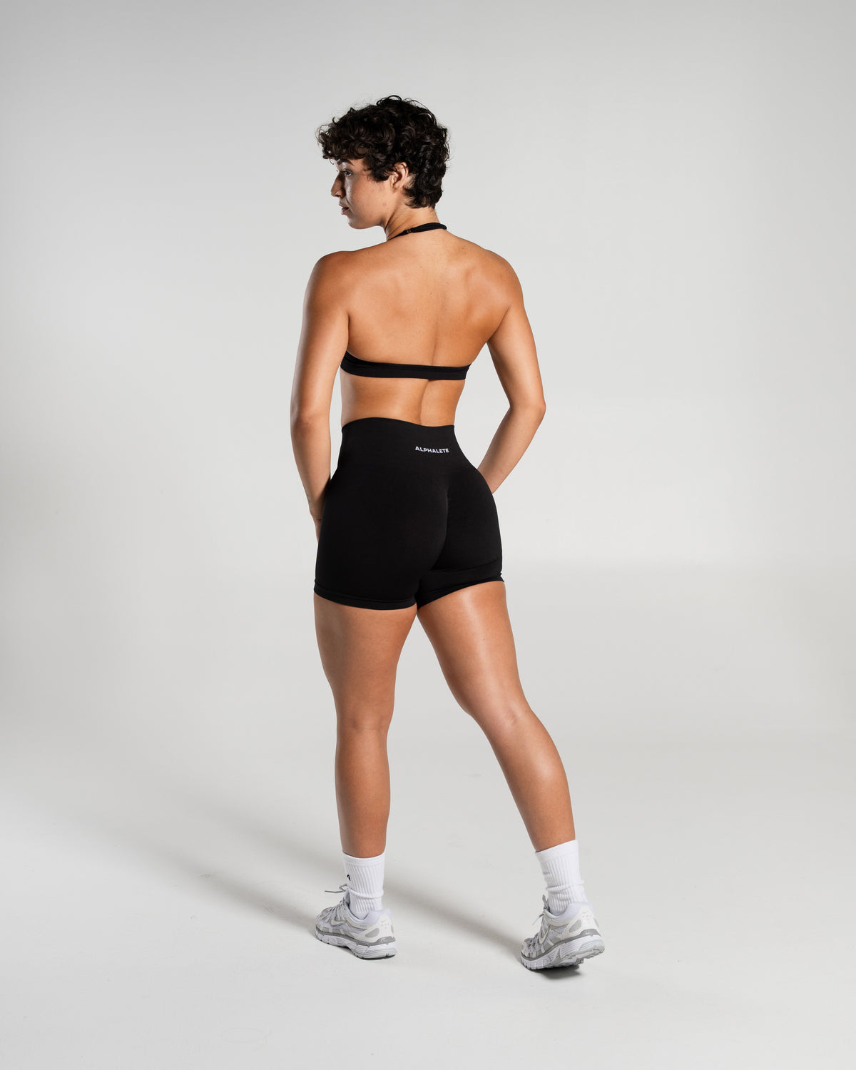 Alphalete Women's Amplify Mid Rise Short